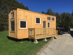 Pressure treated pine deck on porch blocks. Photo courtesy of Jamaica Cottage Shop