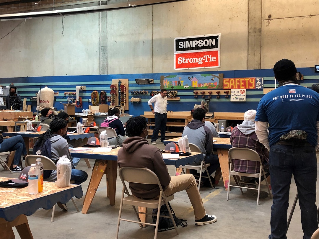 Simpson Strong-Tie employees teaching students about the trade