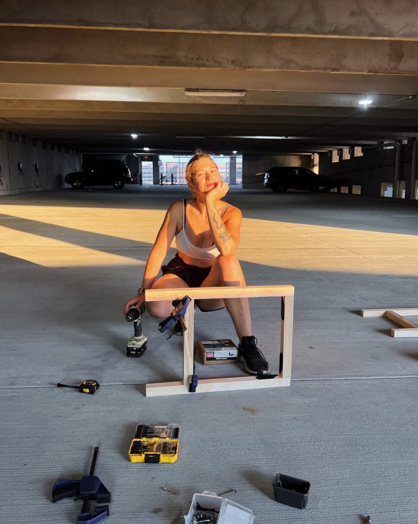 Joana Bianchi in the process of making her DIY counter bar stools