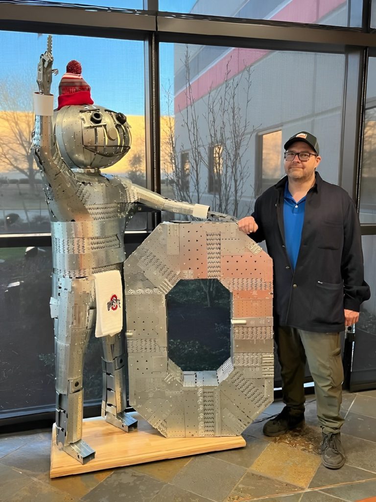 Simpson Strong-Tie Dan Dee with Brutus Buckeye in the Columbus Branch Lobby