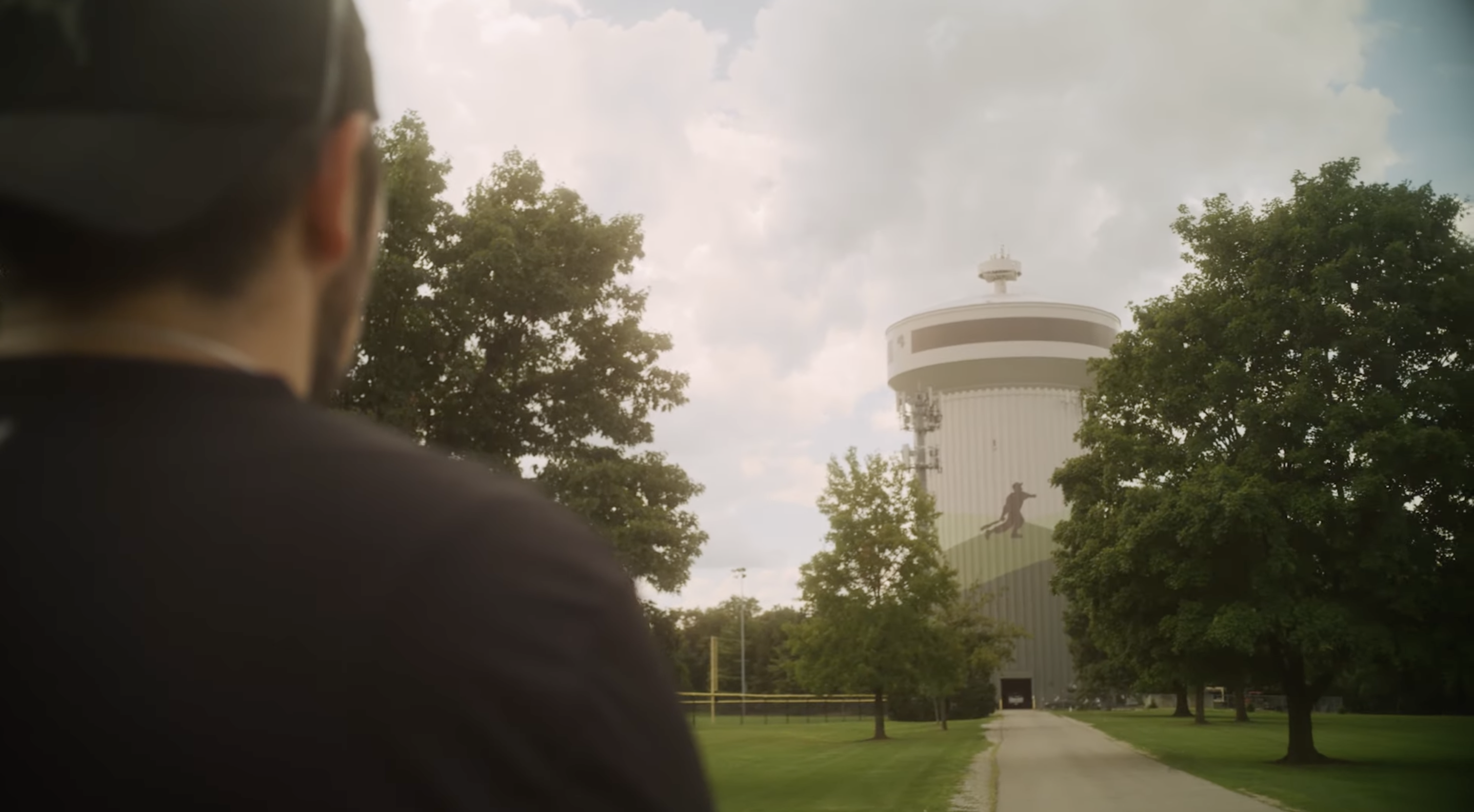 Curtis gazes at a water tower