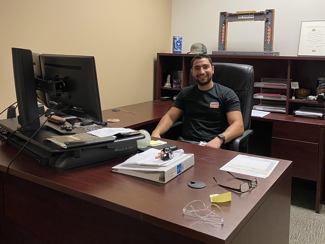 Simpson Strong-Tie Hady at his desk