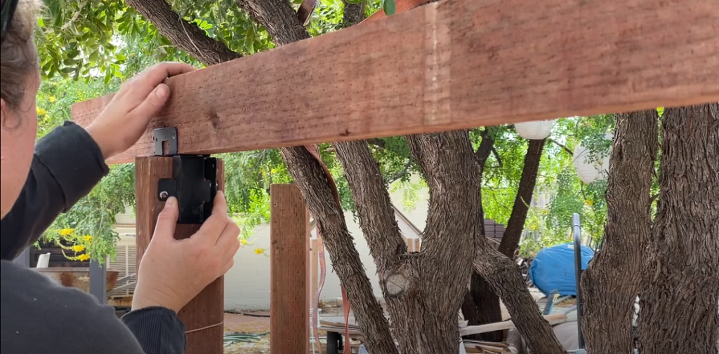 Sadie Mae John aka The Awesome Orange installing Simpson Strong-Tie APRTR Decorative Rigid Tie® Rail Connector