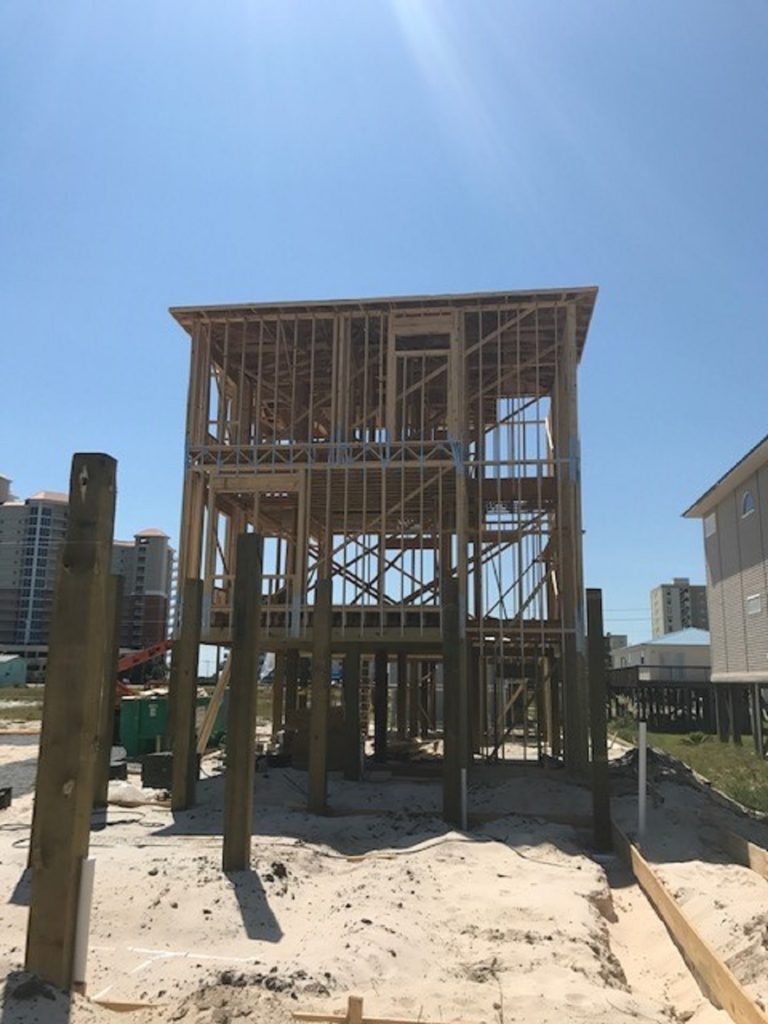 Home on the beach being retrofitted for a high-wind region