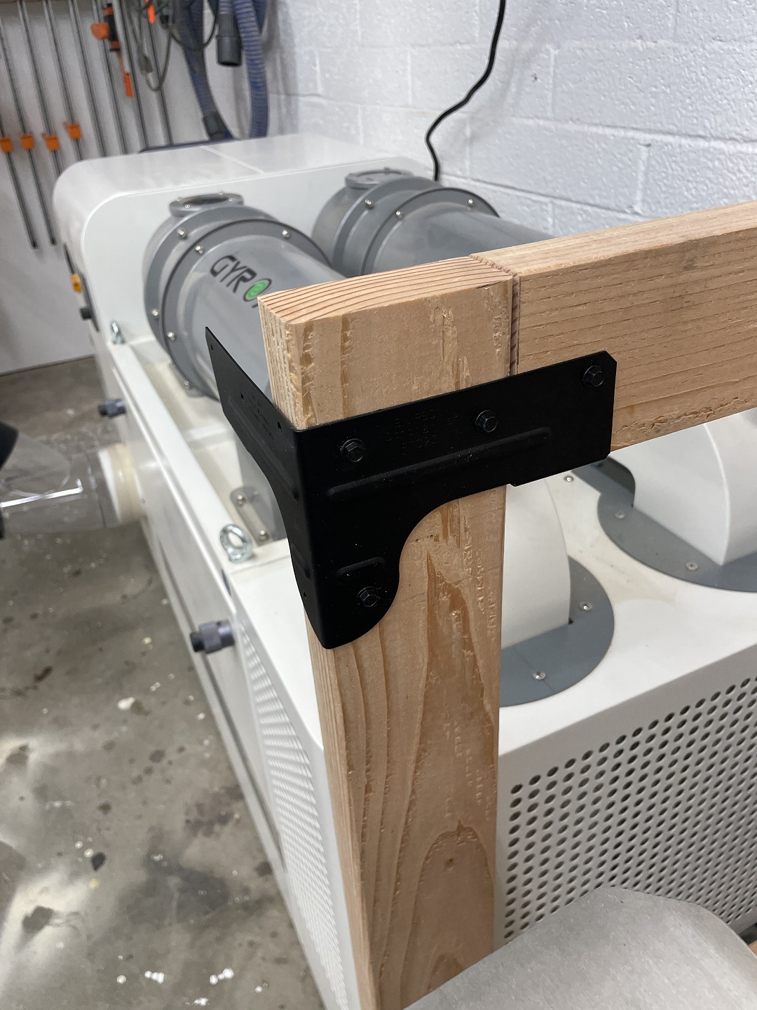 Simpson Strong-Tie Outdoor Accents® APRTC Rigid Tie® Corner Connector attaching the workbench together 