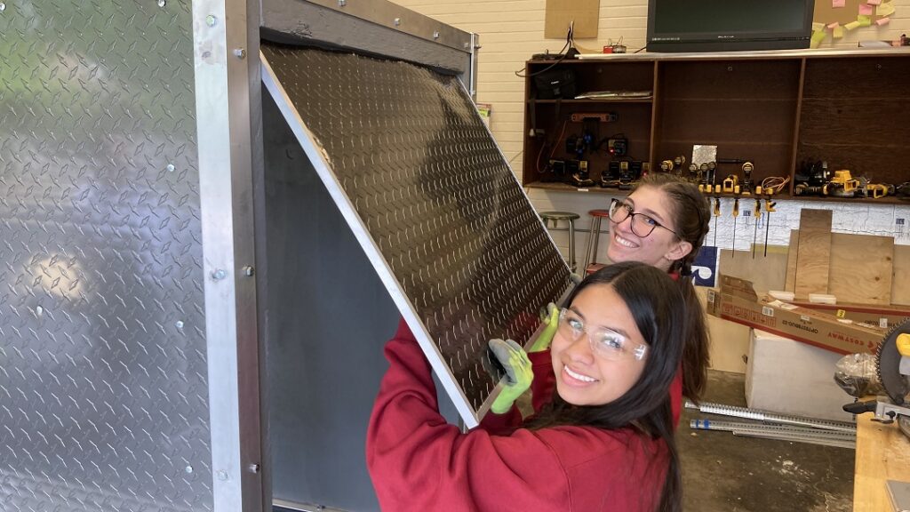 Carondelete students working on the rest station build