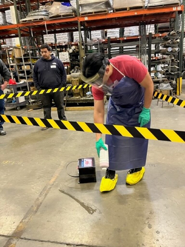 West Chicago employees cleaning up a mock spill for Safety Day