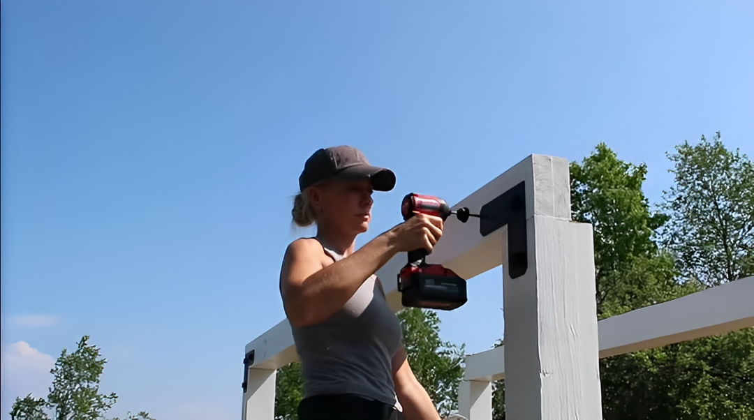 Dena assembling the structure with Simpson Strong-Tie Outdoor Accent hardware