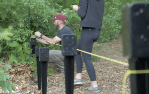 Placing the EZ spikes down for the garden fence