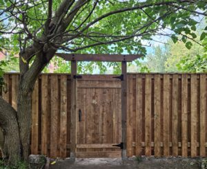 Wood fence and gate by Andrew Peterson