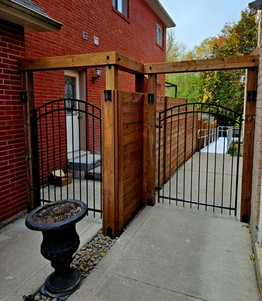Walkway with gate and fence by Andrew Peterson
