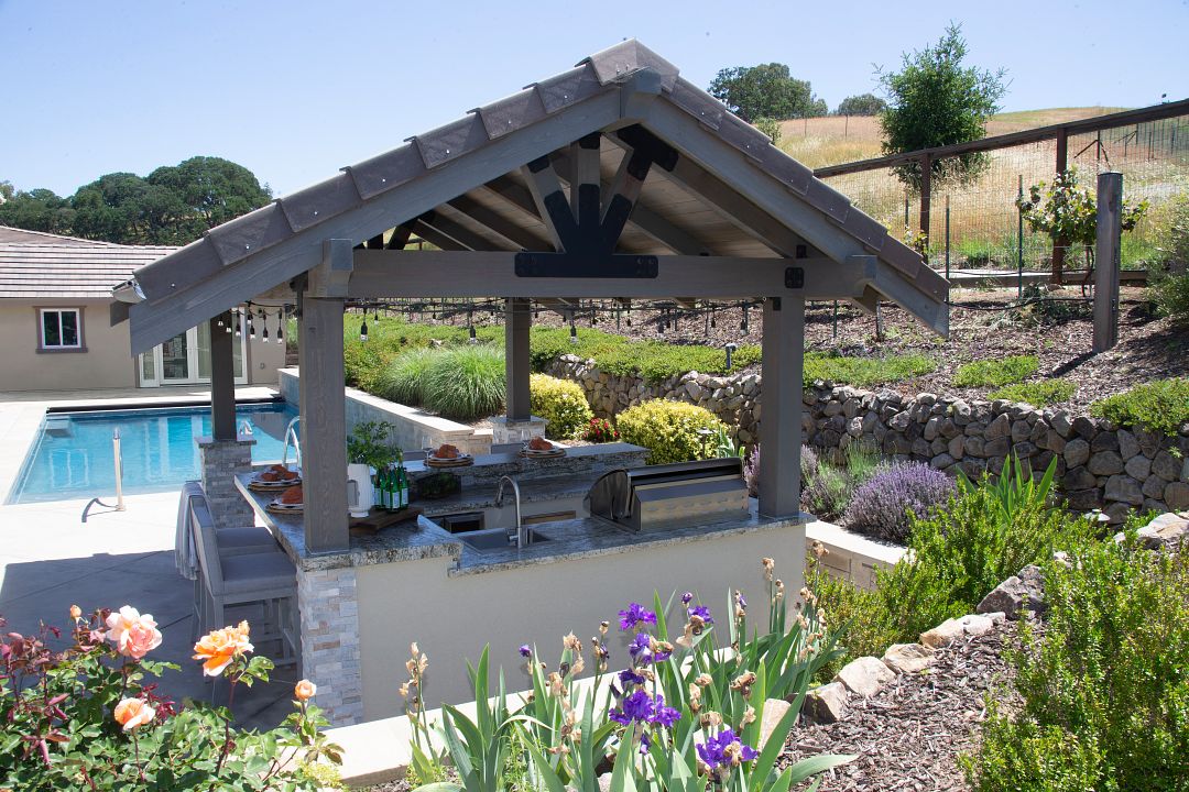 Unified Elegance: Harmonizing Deck and Pergola Hardware with Outdoor Accents