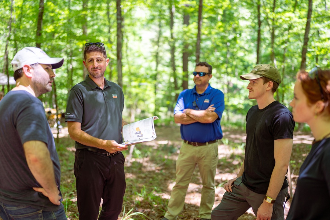 Simpson Strong-Tie’s Jason Dees and Daniel Hesington at StickBuilt ‘25, supporting students with hands-on mass timber design and construction.© C.W. Newell Photography