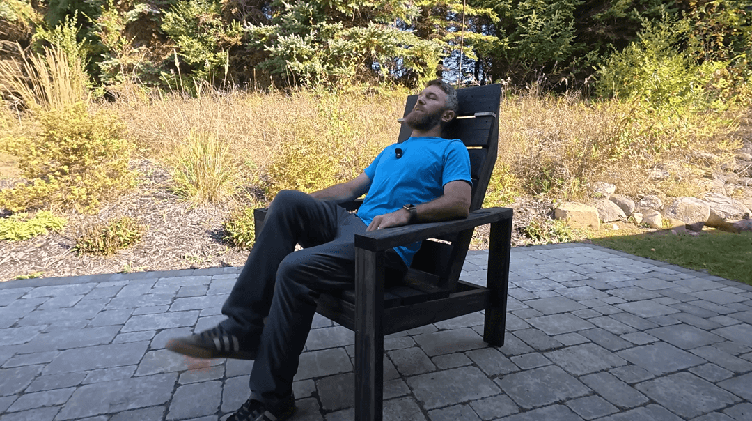 Jamison relaxing in the new and improved chair