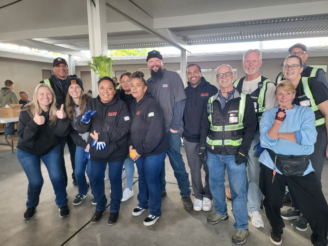 Give Back Commitee with The Gift of Groceries Gift